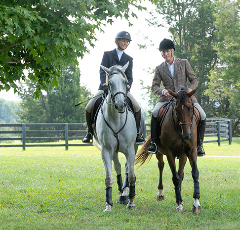 Couple Horseback Riding