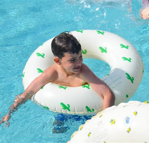 Little boy in swimming pool