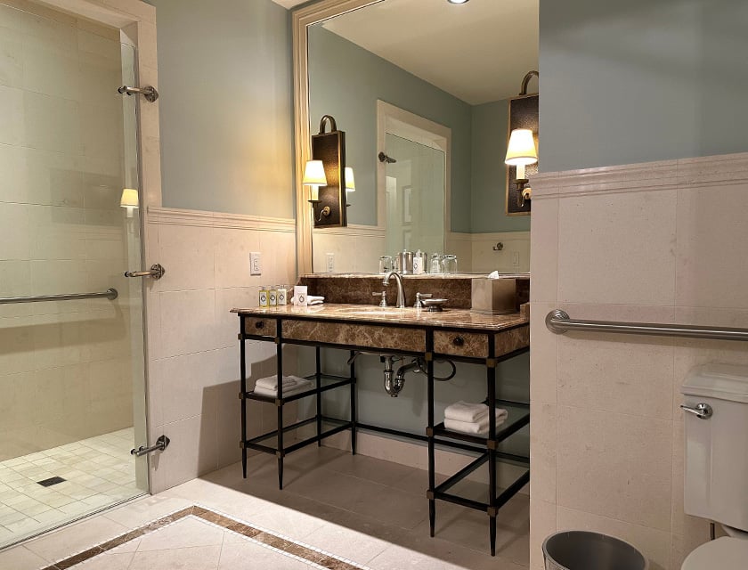 ADA bathroom sink and vanity and shower